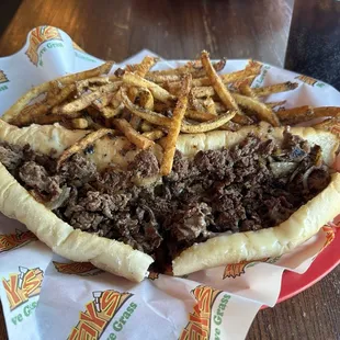12" steak with Cooper Sharp &amp; onions, fries.