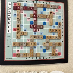 a scrabble board on a wall