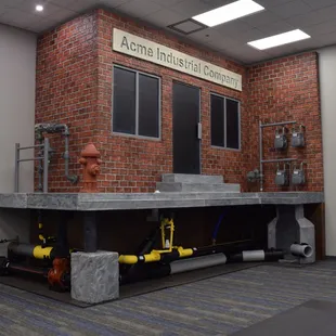 Foam building for pipe display