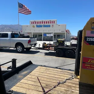 the back of a truck with a flag on it