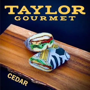 a cut in half sandwich on a cutting board
