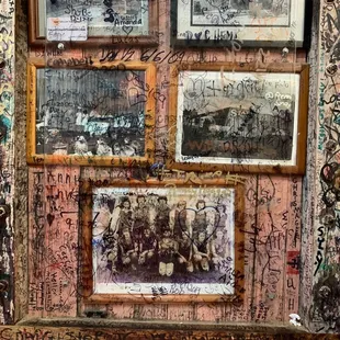 a wall covered in graffiti