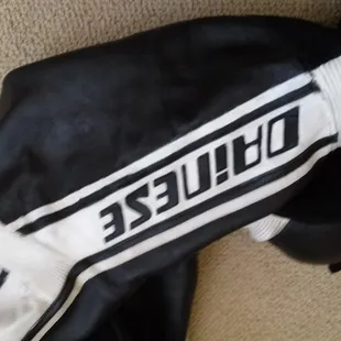 Lettering and seems had busted. Looking good once Barbara got her hands on it.