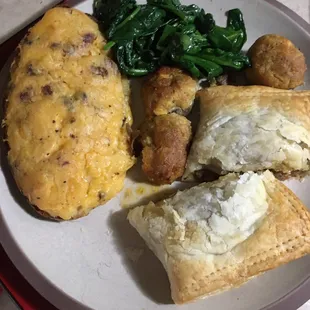 cajun potato, seafood stuffed mushrooms, meat pie (spinach is mine). so good!!! 35 minutes to cook all 3 from frozen.