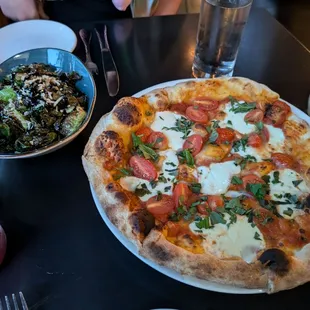 Margarita pizza and brussel sprouts with balsamic and pecorino