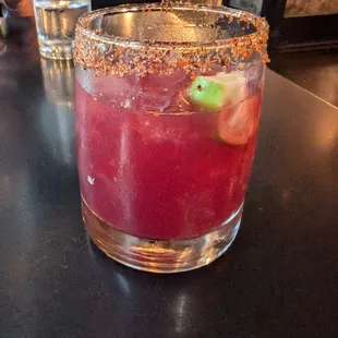 Pomegranate margarita with a tajin rim
