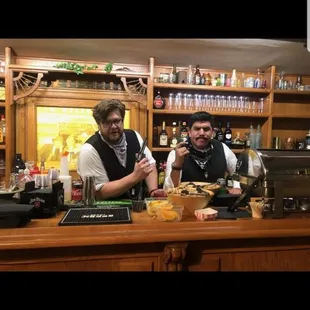 Travis and Louie protecting the saloon