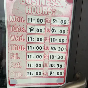 a business hours sign