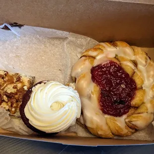 a variety of pastries in a box