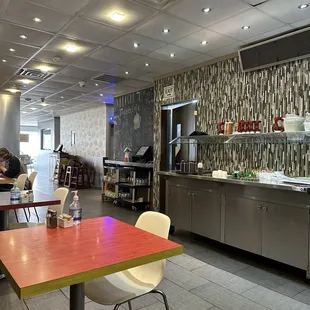a view of the kitchen and dining area