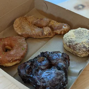 a variety of donuts in a box