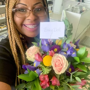 My Baby Doll loves her flowers!! Thank you Taylor's Florist!!