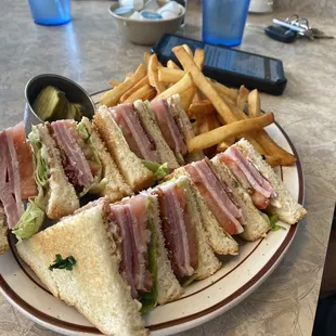 Club sandwich and fries