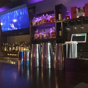 a bar with a television in the background