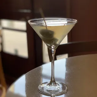 Dirty gin martini with stuffed blue cheese olives for the win!