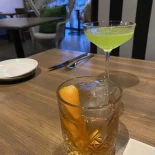 two cocktails on a table
