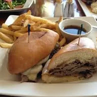 a sandwich and fries on a plate