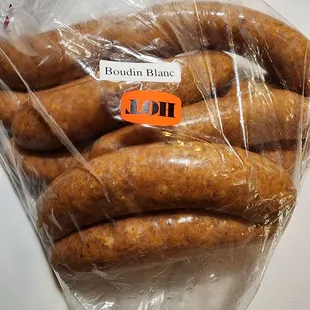 a bunch of sausage wrapped in plastic