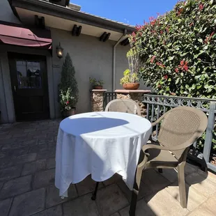 Outdoor Patio (3 more tables not pictured), with sun shade umbrellas and standing heaters available upon request