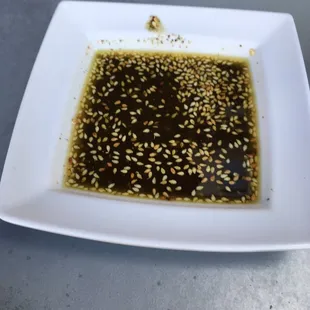 Oil infused with zatar and sesame seeds