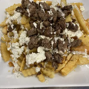 Get a load of these loaded fries - topped with gluten-free gyro meat