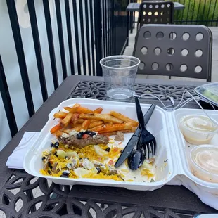 Fries with lamb, beef, rice, beans, etc. can't even finish it there was so much! Yummy