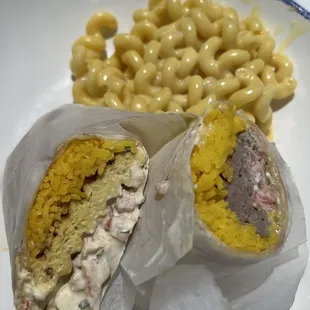 Two half wraps with a side of Mac and cheese