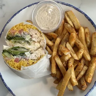 Chicken skewer wrap with fries (pro tip: get the cucumber dill and chipotle sauce together)