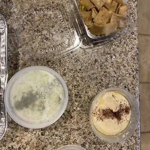 Salad, hummus, tzaziki