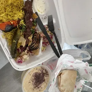 Beef Kabab with Rice;  Pita Bread, and Hummus