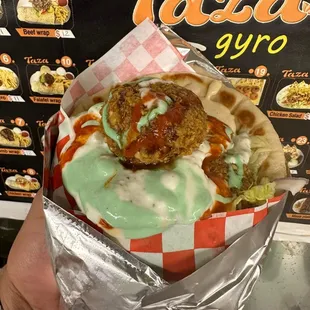  hand holding a wrapper