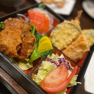 a bento box of food