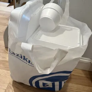 A large bag filled with styrofoam, from one family&apos;s dinner