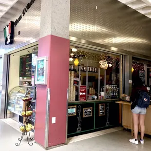 Store is pretty small - there are benches facing the train tracks