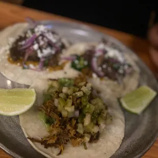three tacos on a plate