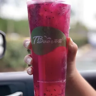 Dragonfruit Tea with strawberry popping boba!