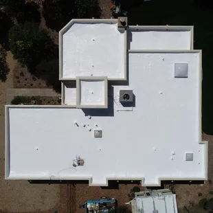 Gaco S-20 seamless roof system with 50 year material warranty.