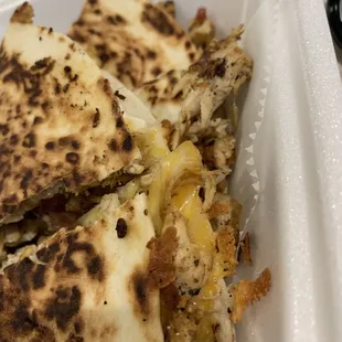 Side shot of the Chicken Bacon Ranch Quesadilla with extra meat.