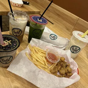 a tray of food and drinks on a table