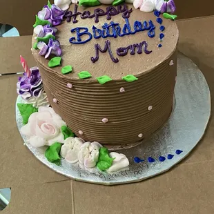 Custom chocolate cake with chocolate ganache between the layers and frosted in chocolate buttercream