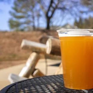 a glass of beer on a table