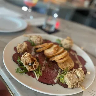Beef carpaccio with oysters