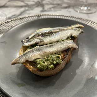 White anchovy, pesto oil, grilled bread