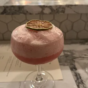 Hibiscus martini-- Bolden vodka, hibiscus cordial, lime juice, St Germain, hibiscus foam