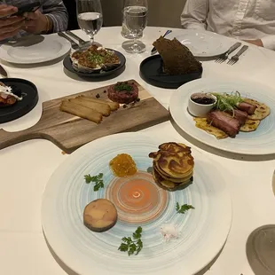 Our starters spread - foie gras, pork belly, tartare, caviar
