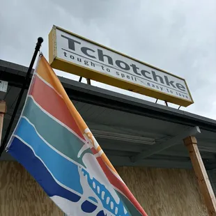 Front and sign. Hurricane Milton coming, therefore boarded up windows