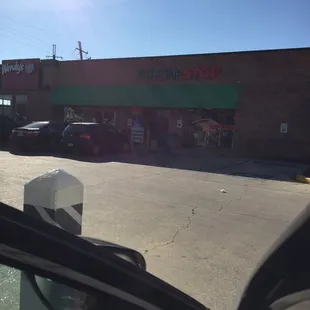 a car parked in front of a store