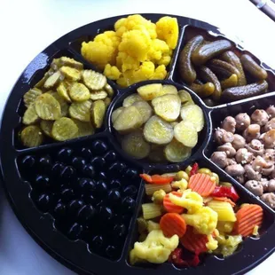 A large relish tray, made for a Thanksgiving dinner.