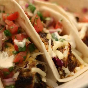 three tacos on a plate