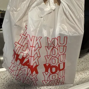 Tamperproof bag and lid on the cup. Lychee Fruit Tea